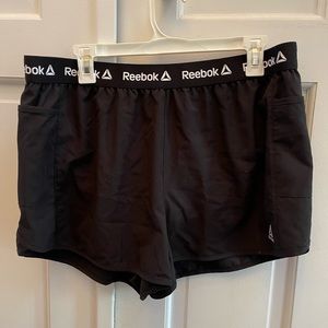 Women’s black Reebok workout shorts, size XL